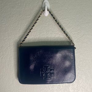 Tory Burch clutch or crossbody bag. Come with long strap.